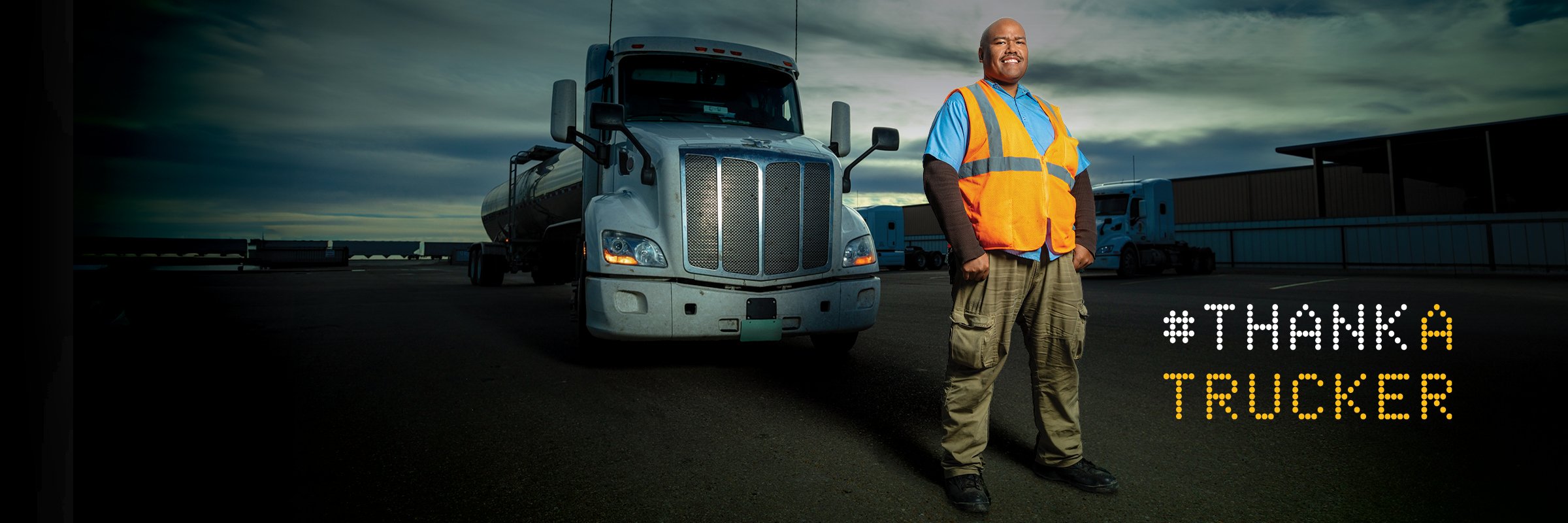 Truck Driver Standing in Front of Truck #ThankATrucker