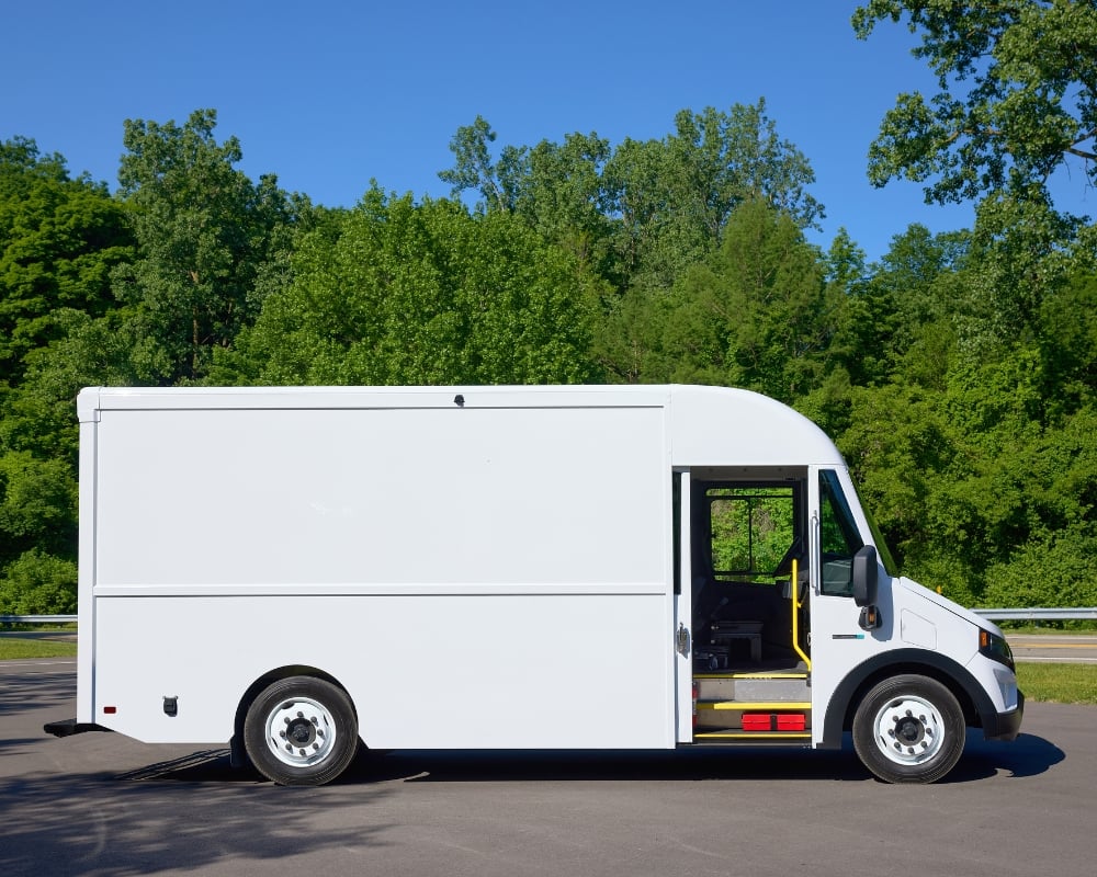 Passenger side view of Blue Arc Class 4 walk-in van